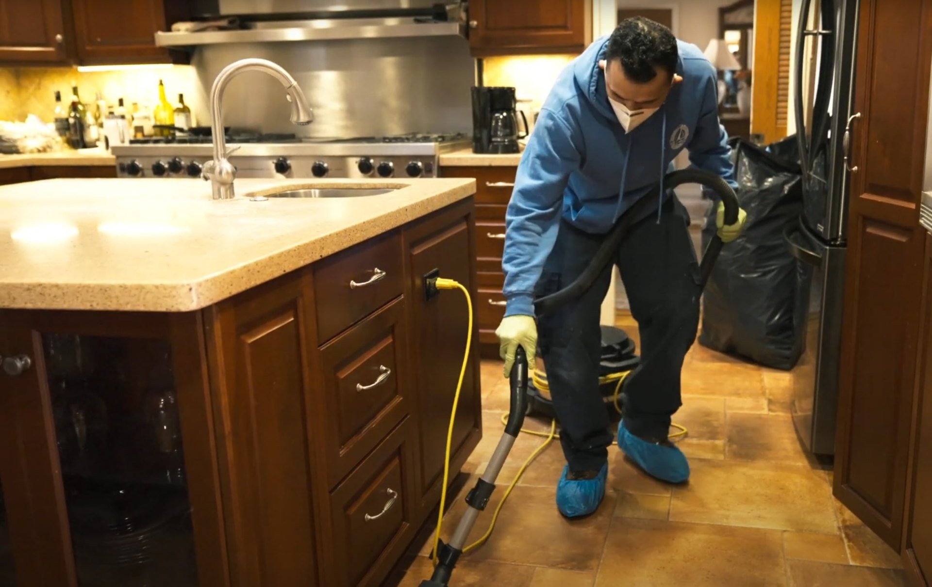 Advanced water extraction and drying equipment being used for restoration Professional technician using specialized equipment for water damage restoration